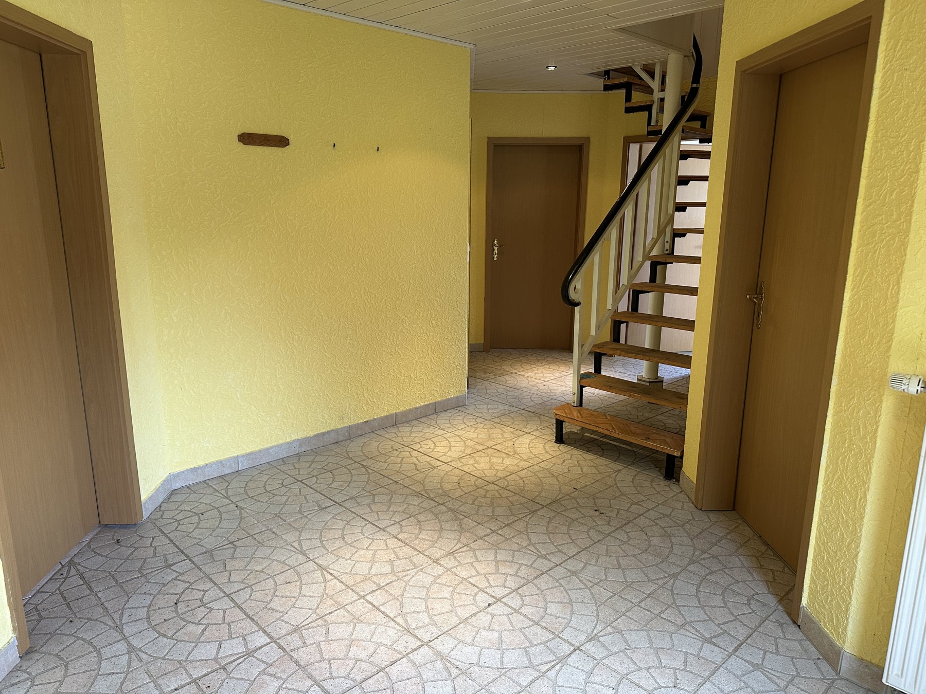 Einfamilienhaus mit Wintergarten & ausbaufähigem Dachgeschoss